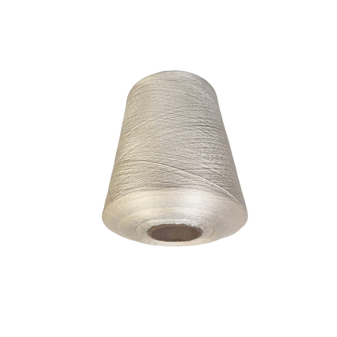 Spool of white thread on a white background