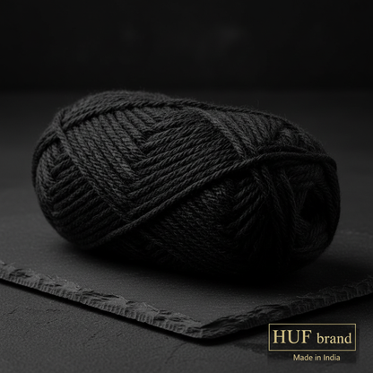 HUF BabyPlush Black yarn close-up macro texture – cinematic hero image showing plush fiber quality